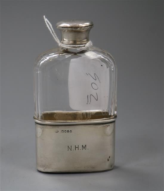 A Victorian silver mounted glass hip flask, with silver cup, London, 1871, 11.8cm.